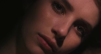 Movie still from “Palo Alto” (2013), directed by Gia Coppola – A woman's face in the dark; Extreme Close Up shot, Low angle