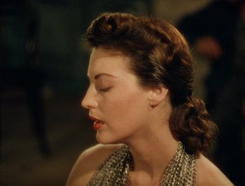 Movie still from “Pandora and the Flying Dutchman” (1951), directed by Albert Lewin – A beautiful woman with her eyes closed; Close Up shot, Over the shoulder angle