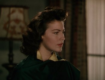 Movie still from “Pandora and the Flying Dutchman” (1951), directed by Albert Lewin – A person wearing a dress; Close Up shot, Over the shoulder angle