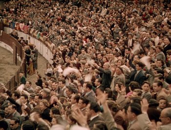 Movie still from “Pandora and the Flying Dutchman” (1951), directed by Albert Lewin – A large crowd of people in a stadium; Extreme Wide shot, High angle