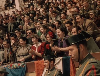 Movie still from “Pandora and the Flying Dutchman” (1951), directed by Albert Lewin – A group of people sitting in a room; Wide shot, High angle