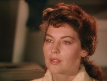 Movie still from “Pandora and the Flying Dutchman” (1951), directed by Albert Lewin – A person wearing a white shirt; Close Up shot, Over the shoulder angle