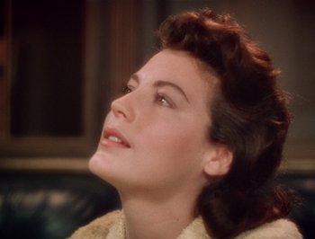 Movie still from “Pandora and the Flying Dutchman” (1951), directed by Albert Lewin – A person wearing a sweater looking up; Close Up shot, High angle