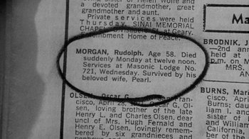 Movie still from “Paper Moon” (1973), directed by Peter Bogdanovich – A newspaper article with a string; Extreme Close Up shot, High angle