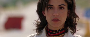Movie still from “Paradise Now” (2005), directed by Hany Abu-Assad – A person wearing a neck scarf; Close Up shot, Low angle