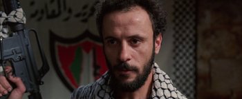 Movie still from “Paradise Now” (2005), directed by Hany Abu-Assad – A person with a beard; Close Up shot, Low angle