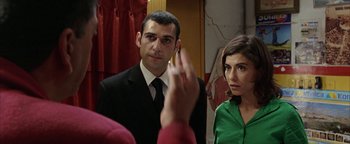 Movie still from “Paradise Now” (2005), directed by Hany Abu-Assad – A man and a woman looking in a mirror; Medium shot, Over the shoulder angle
