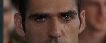 Movie still from “Paradise Now” (2005), directed by Hany Abu-Assad – A man's eyes and face; Extreme Close Up shot, High angle
