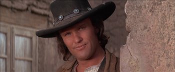 Movie still from “Pat Garrett & Billy the Kid” (1973), directed by Sam Peckinpah – A person wearing a cowboy hat; Close Up shot, Low angle