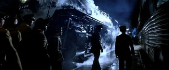 Movie still from “Pearl Harbor” (2001), directed by Michael Bay – A steam engine train on the tracks at night; Wide shot, Low angle