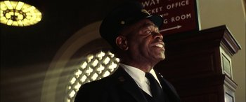 Movie still from “Pearl Harbor” (2001), directed by Michael Bay – An older man in a uniform is looking up; Close Up shot, Low angle