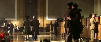 Movie still from “Pearl Harbor” (2001), directed by Michael Bay – A group of people standing in a room; Wide shot, Low angle