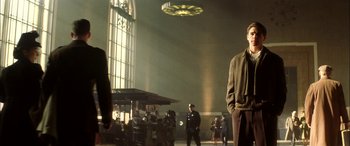 Movie still from “Pearl Harbor” (2001), directed by Michael Bay – A group of people standing in front of a clock tower; Wide shot, Low angle