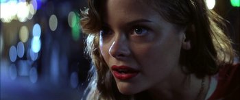 Movie still from “Pearl Harbor” (2001), directed by Michael Bay – A woman's face with red lipstick; Close Up shot, Over the shoulder angle