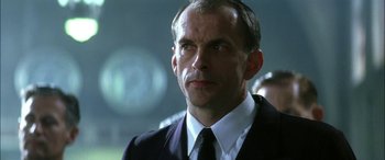 Movie still from “Pearl Harbor” (2001), directed by Michael Bay – A man in a suit and a tie; Close Up shot, Low angle