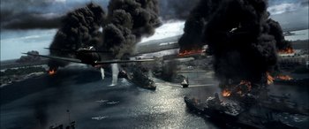 Movie still from “Pearl Harbor” (2001), directed by Michael Bay – An aerial view of a war scene with planes flying in the air; Extreme Wide shot, High angle