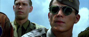 Movie still from “Pearl Harbor” (2001), directed by Michael Bay – A person wearing sunglasses; Close Up shot, Low angle