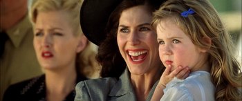 Movie still from “Pearl Harbor” (2001), directed by Michael Bay – A person with a hat on; Close Up shot, Over the shoulder angle
