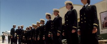 Movie still from “Pearl Harbor” (2001), directed by Michael Bay – A group of women in uniform marching down a street; Wide shot, Low angle