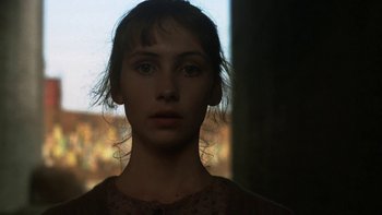 Movie still from “Pennies from Heaven” (1981), directed by Herbert Ross – A young woman is looking into the camera; Close Up shot, Over the shoulder angle