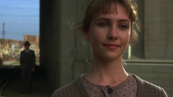 Movie still from “Pennies from Heaven” (1981), directed by Herbert Ross – A young woman is smiling for the camera; Close Up shot, Low angle