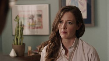 Movie still from “People Places Things” (2015), directed by Jim Strouse – A person with long hair; Close Up shot, Over the shoulder angle