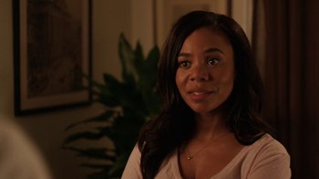 Movie still from “People Places Things” (2015), directed by Jim Strouse – A beautiful young woman with long black hair; Close Up shot, Over the shoulder angle