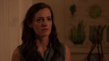 Movie still from “People Places Things” (2015), directed by Jim Strouse – A person with long brown hair; Close Up shot, Over the shoulder angle