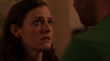 Movie still from “People Places Things” (2015), directed by Jim Strouse – A person looking at a person; Close Up shot, Over the shoulder angle