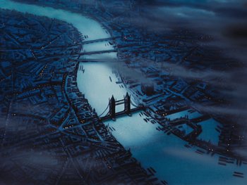 Movie still from “Peter Pan” (1953), directed by Jack Kinney – An aerial view of a city at night with a bridge crossing over it; Extreme Wide shot, High angle