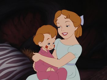 Movie still from “Peter Pan” (1953), directed by Jack Kinney – A woman holding a child in her arms; Medium shot, High angle