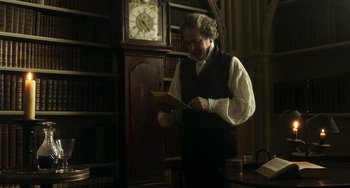 Movie still from “Peterloo” (2018), directed by Mike Leigh – An older man in a library reading a letter; Medium shot, Low angle