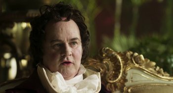 Movie still from “Peterloo” (2018), directed by Mike Leigh – An older woman wearing a ruffled white shirt; Close Up shot, High angle