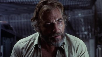 Movie still from “Phase IV” (1974), directed by Saul Bass – A person wearing a shirt; Close Up shot, Low angle