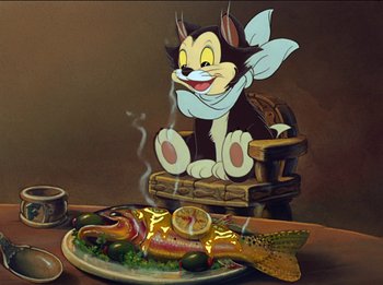 Movie still from “Pinocchio” (1940), directed by Jack Kinney – A cat sitting in a chair next to a plate of food; Wide shot, Low angle