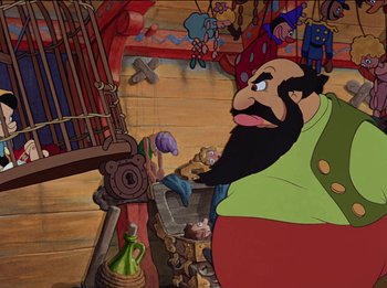 Movie still from “Pinocchio” (1940), directed by Jack Kinney – An animated picture of a man with a beard; Wide shot, Over the shoulder angle