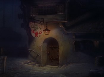Movie still from “Pinocchio” (1940), directed by Jack Kinney – An image of an old building with a sign on the wall; Extreme Wide shot, High angle