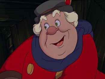 Movie still from “Pinocchio” (1940), directed by Jack Kinney – A cartoon character smiling for the camera; Close Up shot, Over the shoulder angle
