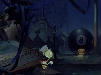 Movie still from “Pinocchio” (1940), directed by Jack Kinney – A scene with a number eight ball in the background; Wide shot, Low angle