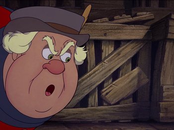 Movie still from “Pinocchio” (1940), directed by Jack Kinney – An old man with an angry look on his face; Close Up shot, Over the shoulder angle