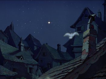 Movie still from “Pinocchio” (1940), directed by Jack Kinney – An animated scene of a town at night with a bird flying in front of the moon; Extreme Wide shot, Low angle