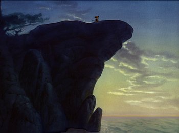 Movie still from “Pinocchio” (1940), directed by Jack Kinney – A person standing on top of a cliff; Extreme Wide shot, Low angle