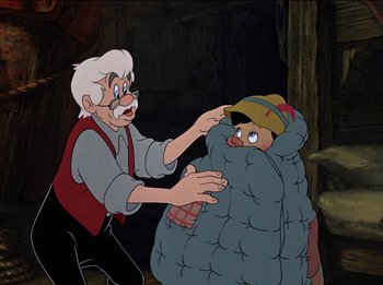 Movie still from “Pinocchio” (1940), directed by Jack Kinney – An old man and an old man with a hat on; Medium shot, Over the shoulder angle