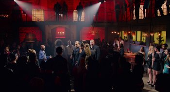 Movie still from “Pitch Perfect 2” (2015), directed by Elizabeth Banks – A group of people standing in front of an audience; Extreme Wide shot, High angle