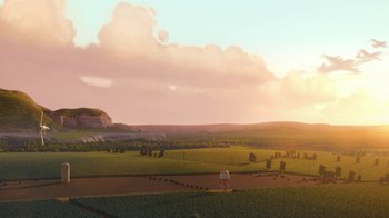 Movie still from “Planes” (2013), directed by Klay Hall – An aerial view of an open field at sunset; Extreme Wide shot, Low angle