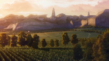 Movie still from “Planes” (2013), directed by Klay Hall – An aerial view of a field with trees and mountains in the background; Extreme Wide shot, High angle