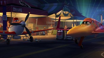 Movie still from “Planes” (2013), directed by Klay Hall – An airplane parked in a parking lot next to other planes; Extreme Wide shot, Low angle