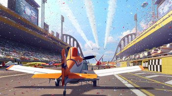 Movie still from “Planes” (2013), directed by Klay Hall – An orange airplane is parked in a parking lot near a stadium; Extreme Wide shot, Low angle