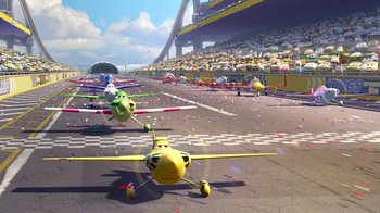 Movie still from “Planes” (2013), directed by Klay Hall – A group of small airplanes on a race track; Extreme Wide shot, High angle