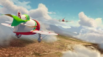 Movie still from “Planes” (2013), directed by Klay Hall – Two planes flying in the sky near a mountain; Extreme Wide shot, Low angle